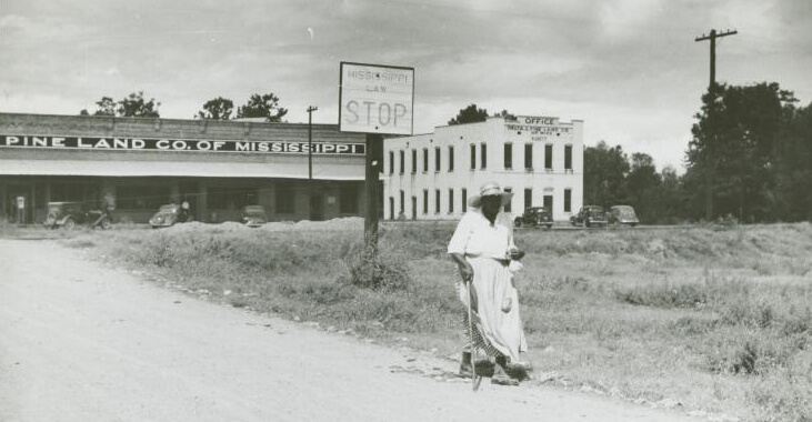 Company stores and offices and clinic of Delta Pine Company, Cotton Plantation, Scott, Mississippi Delta, Mississippi, October 1939. Photograph by Marion Post Wolcott. Courtesy of The New York Public Library, Schomburg Center for Research in Black Culture, Photographs and Prints Division, digitalcollections.nypl.org/items/510d47df-f8d7-a3d9-e040-e00a18064a99. Company stores and offices and clinic of Delta Pine Company, Cotton Plantation, Scott, Mississippi Delta, Mississippi, October 1939. Photograph by Marion Post Wolcott. Courtesy of The New York Public Library, Schomburg Center for Research in Black Culture, Photographs and Prints Division, digitalcollections.nypl.org/items/510d47df-f8d7-a3d9-e040-e00a18064a99.