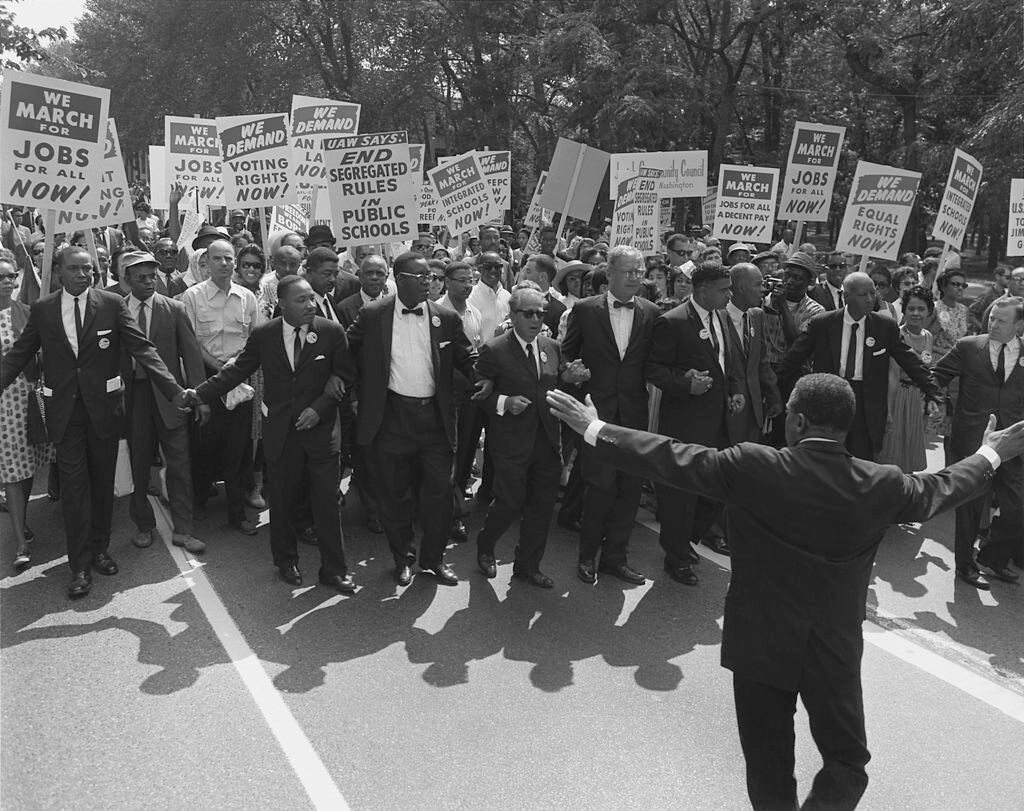 Jewish civil rights activist Joseph L. Rauh, Jr. marching with Martin Luther King, Jr., Washington, DC, August 28, 1963. Photograph by the now defunct United States Information Agency. Courtesy of the National Archives and Records Administration, National Archives Identifier 542002. Photograph in public domain. Jewish civil rights activist Joseph L. Rauh, Jr. marching with Martin Luther King, Jr., Washington, DC, August 28, 1963. Photograph by the now defunct United States Information Agency. Courtesy of the National Archives and Records Administration, National Archives Identifier 542002. Photograph in public domain.