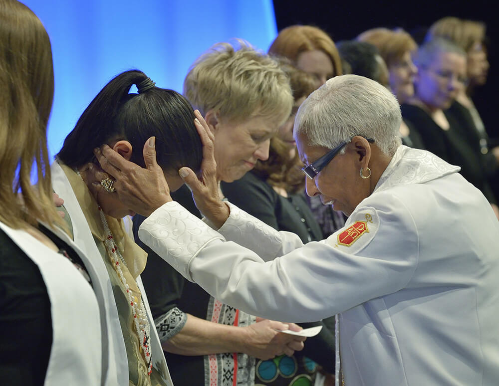 Deaconess consecrated at United Methodist Women's Assembly, Louisville, Kentucky, April 27, 2014. Photograph by Paul Jeffrey. Courtesy of Flickr user UMWomen. Creative Commons license CC BY-NC-ND 2.0. Deaconess consecrated at United Methodist Women's Assembly, Louisville, Kentucky, April 27, 2014. Photograph by Paul Jeffrey. Courtesy of Flickr user UMWomen. Creative Commons license CC BY-NC-ND 2.0.