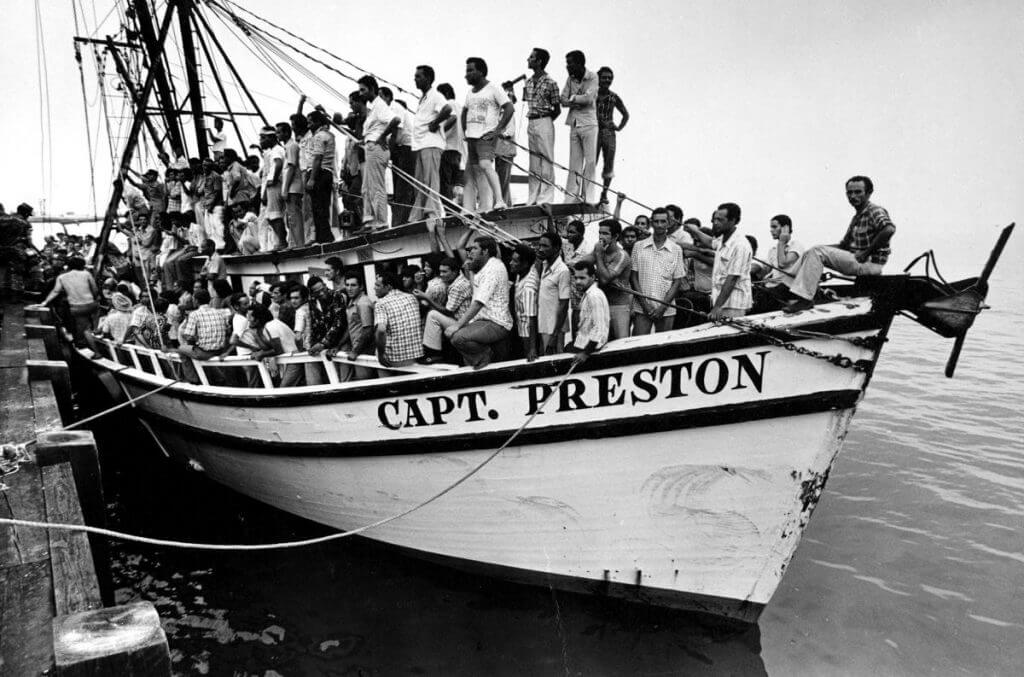 Cuban refugees aboard the Captain Preston who came to the United States during the Mariel Boatlift, Miami, Florida, 1980. Photograph by Miami Herald staff.